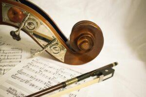 pile of music notes on white textile