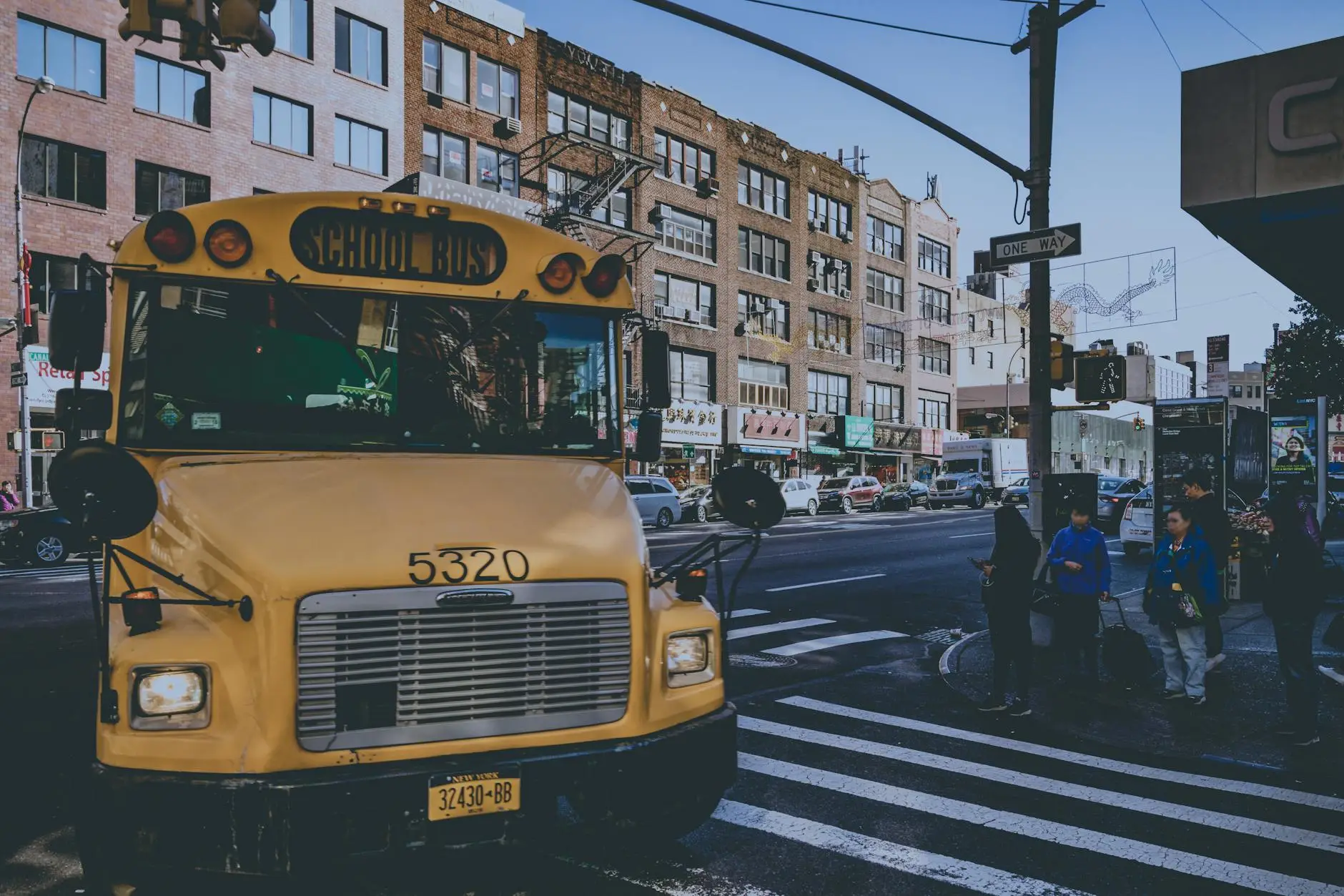 yellow bus on street