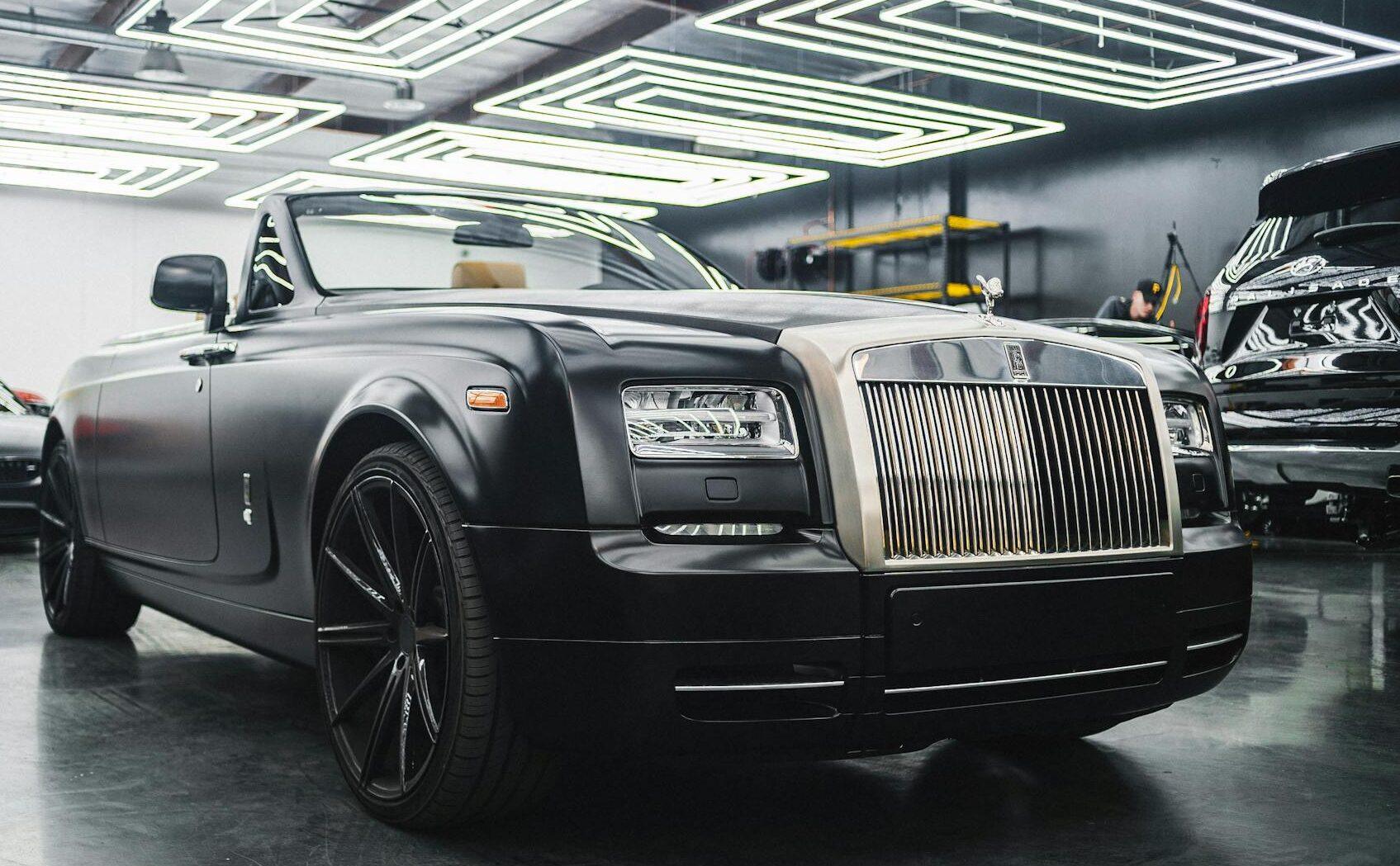 modern black car parked in garage